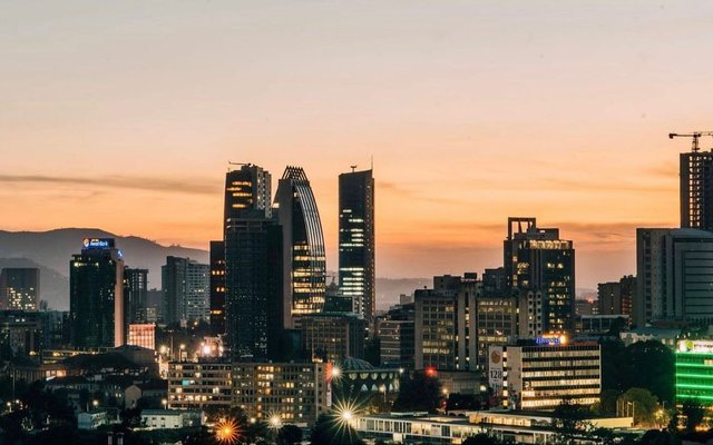 Aerial view of Addis Ababa apartment buildings with Entoto mountains in background